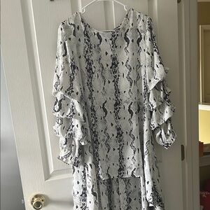 Elegant Snake Print Ruffle shirt with tail great with leggings
